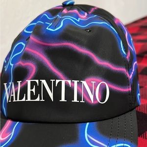 Showcasing Valentino's penchant for vivid motifs, this cap is boldly decorated